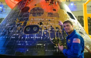 Reid Wiseman and the Capsule - Credit- NASA/Bill Ingalls